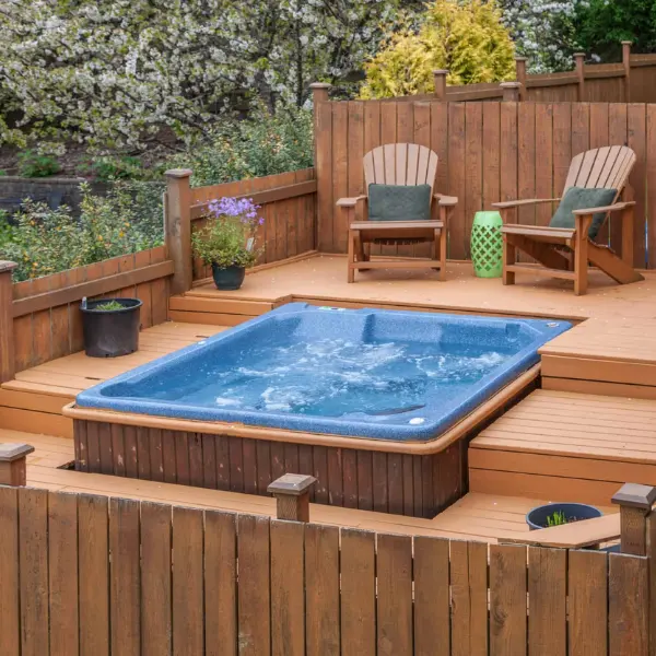 Cold plunge tub beside a garden sauna